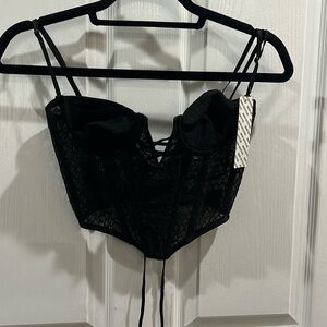 Black lace corset size small.  New